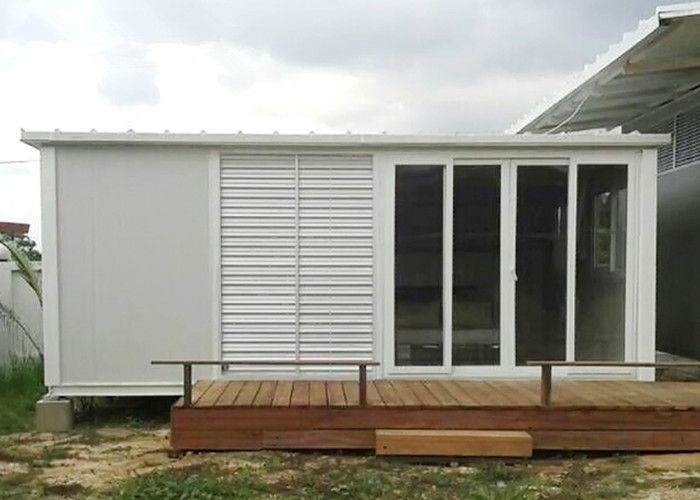 prefab container house with a terren.jpeg